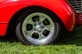 Old classic American red car wheel Royalty Free Stock Photo