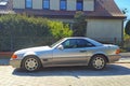 Old classic big luxury coupe car Mercedes Benz 300 SL left side parked