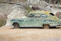 Classic car, rusting away in the desert Royalty Free Stock Photo