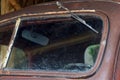 A old classic car with dirty glass and broken windshield, detail of old car Royalty Free Stock Photo