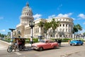 Old classic cars next to the Capitol in downtown Havana Royalty Free Stock Photo