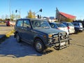 Old green Soviet 4wd car Lada Niva parked