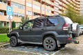 Old classic veteran black offroad big 4wd car Toyota Landcruiser parked