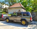 Old classic four wheel drive Jeep Cheerokee private car parked