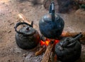 Old classic kettle cooked on firewood is an ancient cooking. Royalty Free Stock Photo