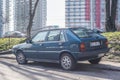 Old classic Lancia hatchback four doors parked