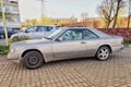 Old classic Mercedes Benz coupe silver grey private car parked