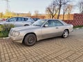 Old classic Mercedes Benz coupe silver grey private car parked