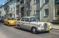 Old classic Mercedes driving on a parade