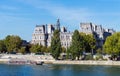 Old classic palace on bank of river Seine in Paris