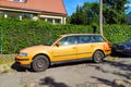 Old vintage orange VW Passat parked