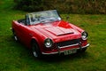 Old classic red car inlet details Royalty Free Stock Photo