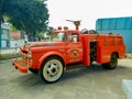 Old classic red Fargo 500 fire truck pumper tanker outdoors. Royalty Free Stock Photo