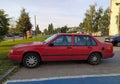 Old classic red Swedish sedan car Volvo 940 parked Royalty Free Stock Photo