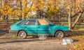 Old classic rusty cheap car Polonez Caro hatchback first model parked