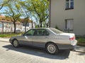 Old classic sedan car Alfa Romeo 166 left side view parked