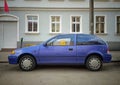 Old classic small car blue Suzuki Swift parked