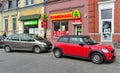 Old classic small car Mini Cooper 2nd generation and Citroen Xsara Picasso parked Royalty Free Stock Photo