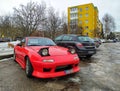 Old classic small red lightweight veteran vintage old roadster sports car Mazda MX-5 Royalty Free Stock Photo