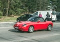 Old classic small red veteran vintage roadster sports car Fiat Barchetta by Andreas Zapatinas driving