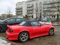 Old classic small red lightweight veteran vintage old roadster sports car Mazda MX-5 NA Miata Royalty Free Stock Photo