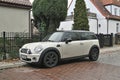 Old classic small supermini subcompact car white Mini Cooper parked Royalty Free Stock Photo