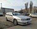 Old classic Swedish veteran big estate station wagon car silver grey Volvo 850 parked