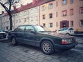 Old classic veteran grunge big heavy dark green Swedish Volvo 940 or Polar sedan car parked Royalty Free Stock Photo