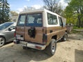 Old classic veteran 4WD offroad car Toyota Landcruiser Turbo LX J70 parked