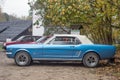 Classic private vintage oldtimer car blue Ford Mustang convertible left side