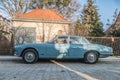 Old classic vintage blue Jaguar 2.8 litre parked