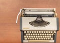 Old classic vintage typewriter on wooden desk Royalty Free Stock Photo