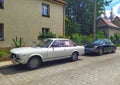 Old classic vintage veteran cars Fiat 124 Sport Coupe CC and Porsche 911