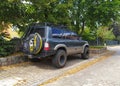 Old classic vintage veteran dark blue 4WD car Nissan patrol 3.0 right side and rear view Royalty Free Stock Photo