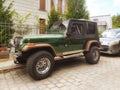 Old classic vintage veteran green car Jeep Wrangler left side