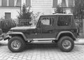 Old classic vintage veteran Jeep Wrangler left side monochrome