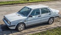 Old classic white Lancia LX sedan left side top front view