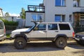 Old white Jeep Cherokee first model side view