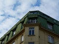 Old classical building detail and copper plated roof