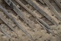 Old clay damaged plaster on the wall of the house