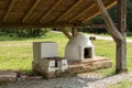 Old clay oven in ASTRA Museum of Traditional Folk Civilization - the largest open air museum in Romania and one of the largest in