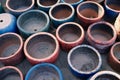 Old clay pots flowerpots closeup. Various used ceramic and clay pots