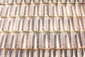 Old clay roof tiles for house as brown backg Royalty Free Stock Photo