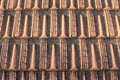 Old clay roof tiles for house as natural brown background Royalty Free Stock Photo