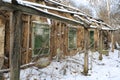 Old clay rural house in winter time