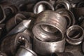 Old clips from automotive bearings. Metal scrap in shallow depth of field. Metal waste