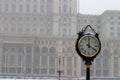 Anniversary outdoor clock  and the Casa Poporului Royalty Free Stock Photo