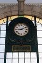 Old clock in central railway station in Porto, Portugal. Hall of famous Sao Bento train station. Interior of ancient station. Royalty Free Stock Photo