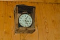 Old clock hanging on the wall