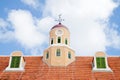 Old clock roof tower and two dormers Royalty Free Stock Photo